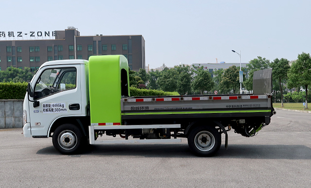 Barreled garbage truck